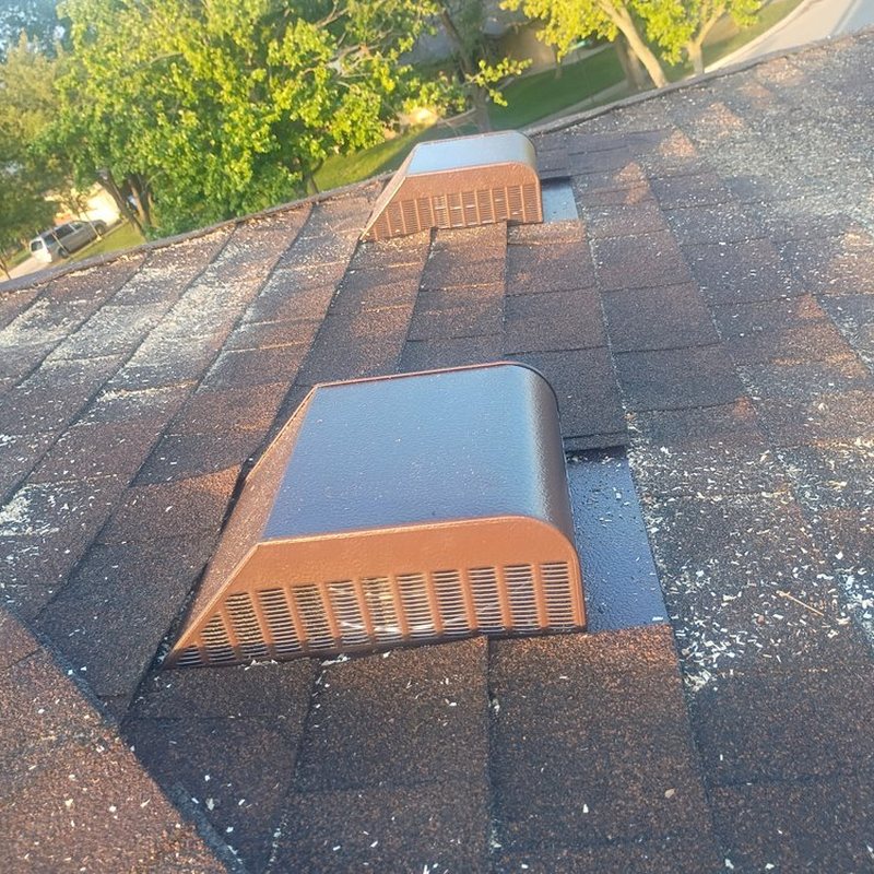 Box vent on a shingle roof