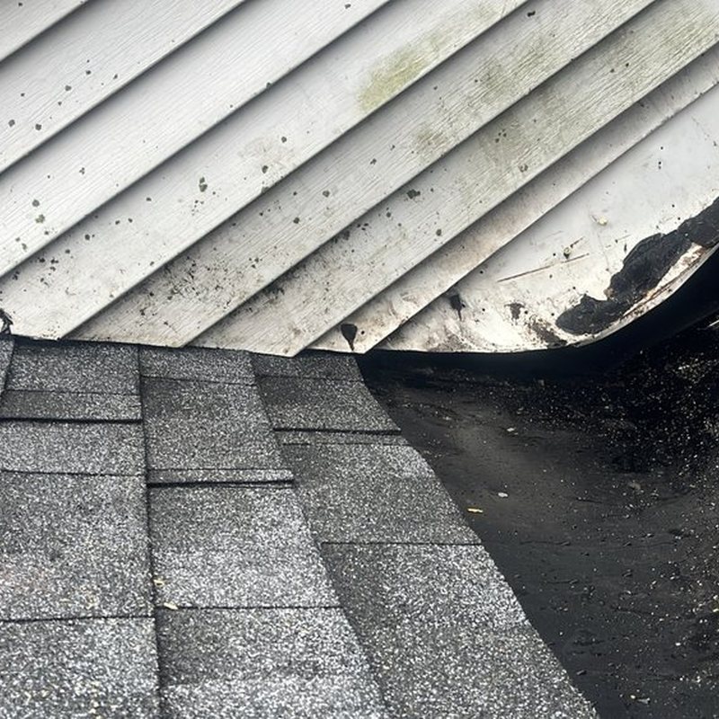 Membrane at the roof-to-wall joint